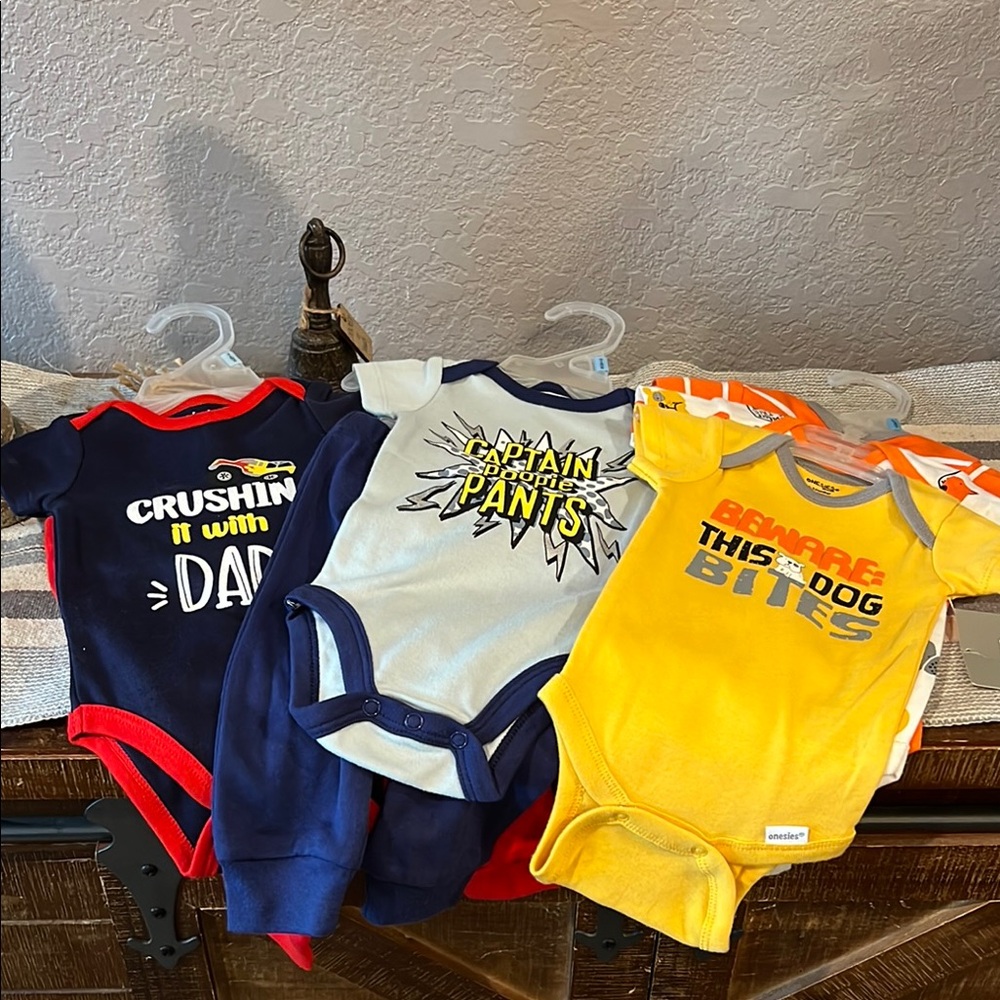 3 Sets Kidgets Navy, White, and Yellow Bodysuit Trio.  1 3-6 Mo, 2 0-3 Mo